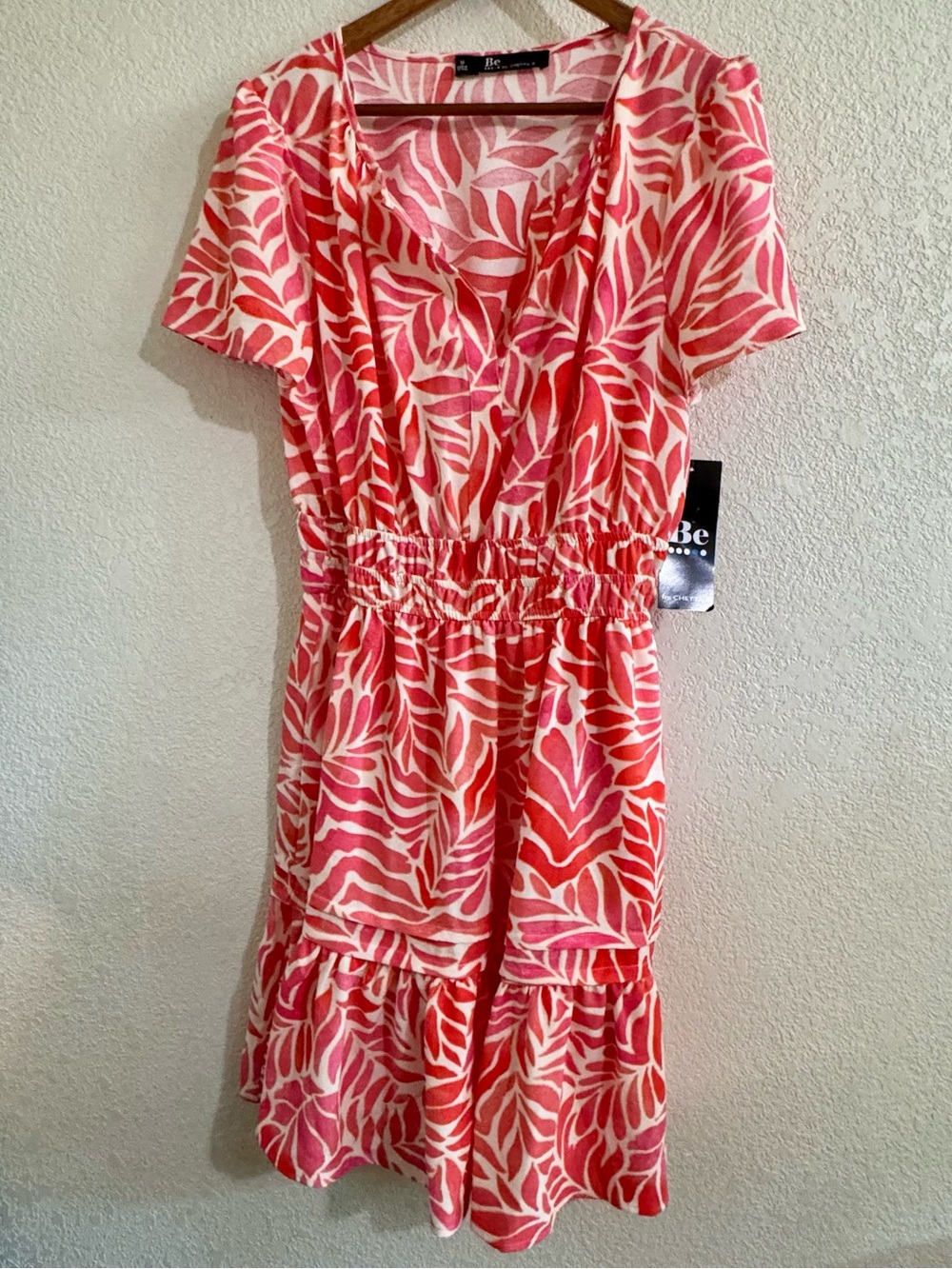 Chetta B vibrant, orange, and white pop over style V-neck mock waist tiered skir